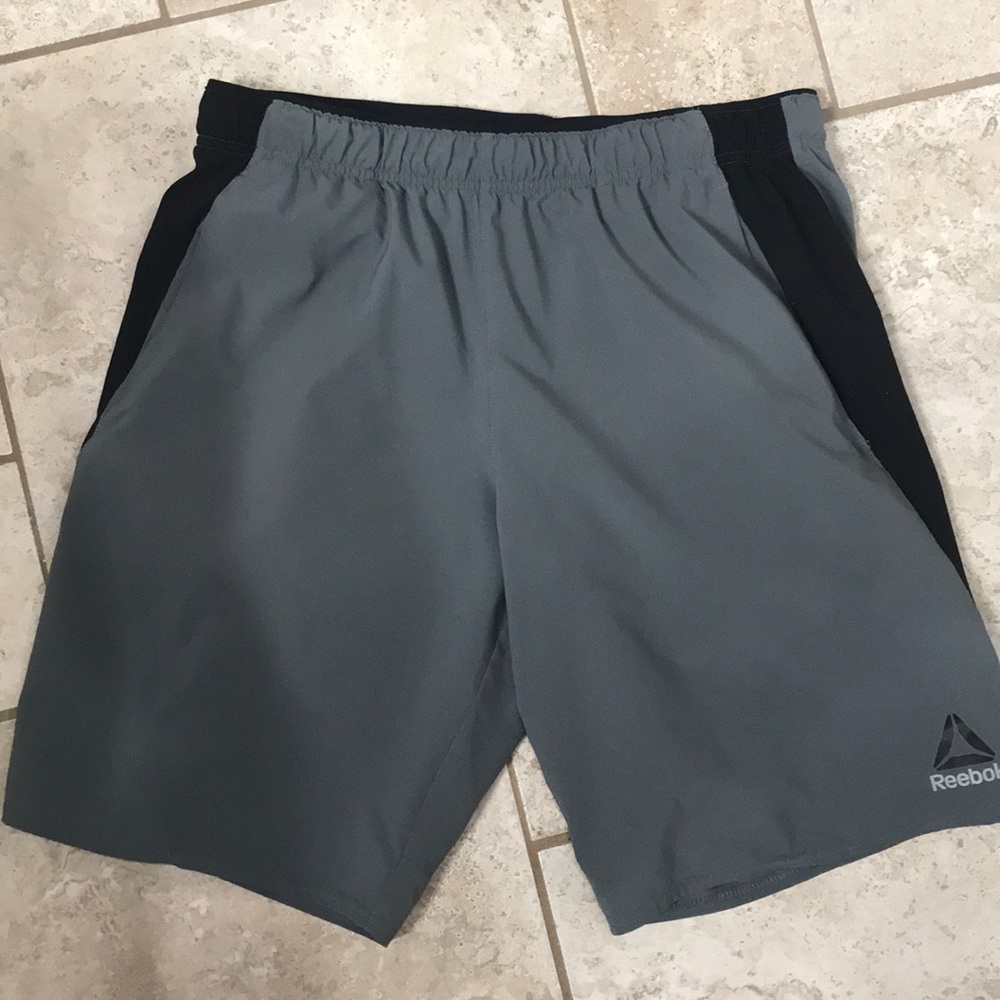 Men’s Reebok size medium gray shorts with pockets